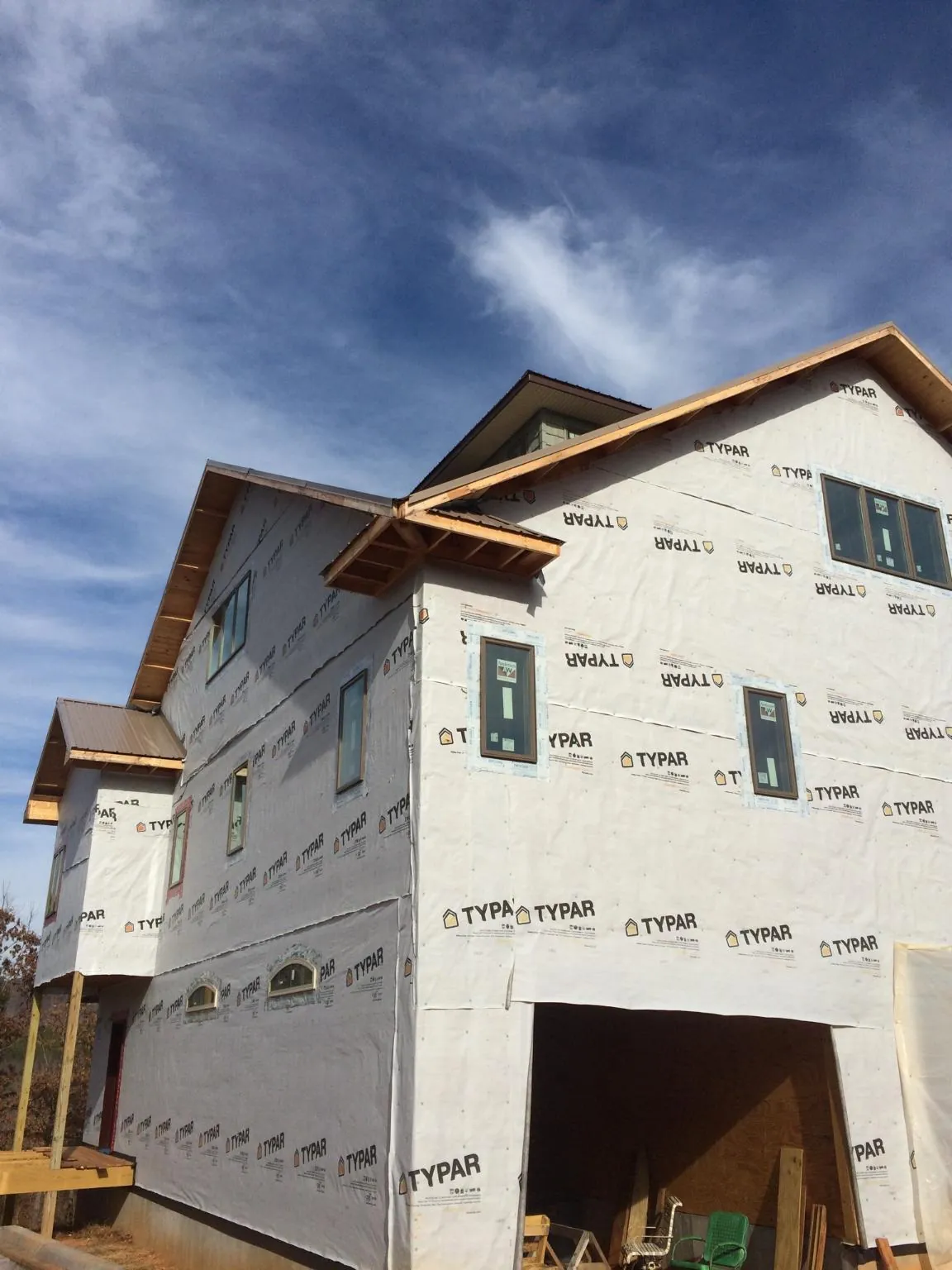 Stick built house wrapped in Typar with new roof framing and dormers in Fowlerville